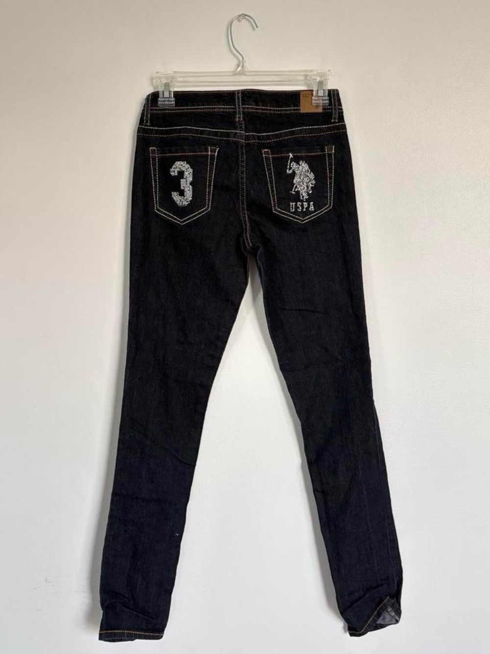 Deal wash polo bedazzled jeans.
